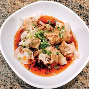 Picture of dish Wontons in Chili Oil Sauce Spicy at Hainan Kitchen