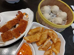 Neptune Wonton Noodle YVR Outlet - Taiwanese & HK Cafe restaurant – fine dining dishes, interior photos, and ambiance.