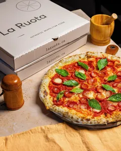 La Ruota West Broadway - Pizza restaurant in Vancouver – fine dining dishes, interior photos, and ambiance.