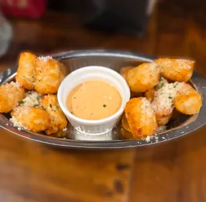 Picture of dish Chippy Parm Tots (GF) at AM Cafe