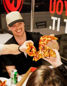 Megabite Pizza Granville St - Pizza restaurant in Vancouver – fine dining dishes, interior photos, and ambiance.