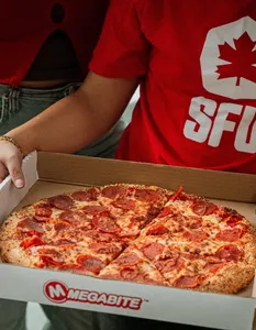 Megabite Pizza Granville St - Pizza restaurant in Vancouver – fine dining dishes, interior photos, and ambiance.